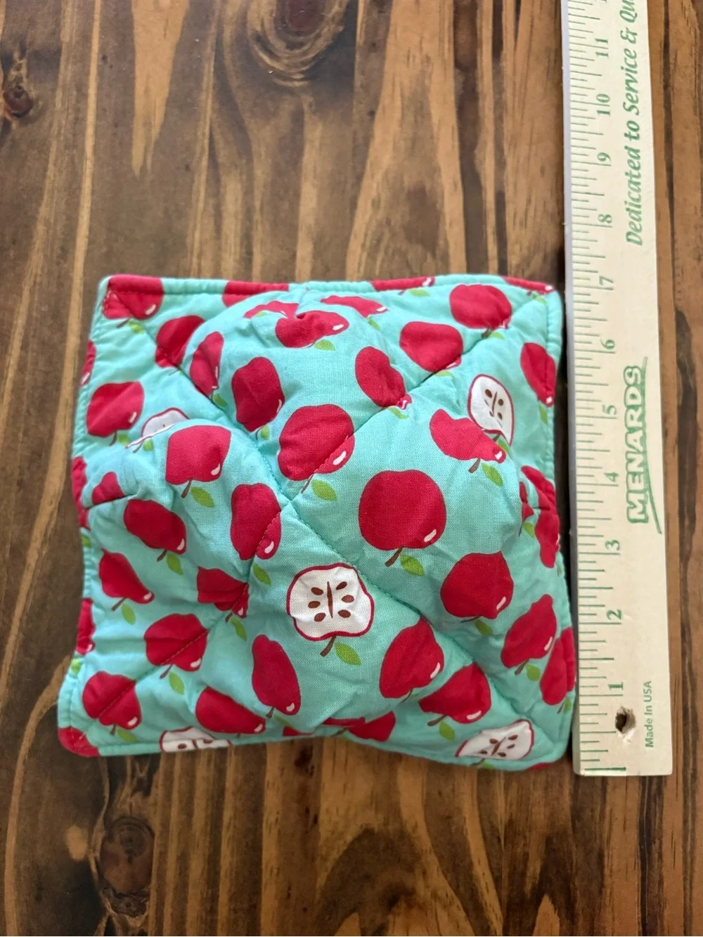 Quilted bowl cozy in classic Apple print with teal background cottagecore